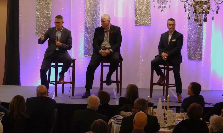 Mark Chipman, John Olfert, and Ron Parent speak at this year's Heritage Centre fundraising gala.