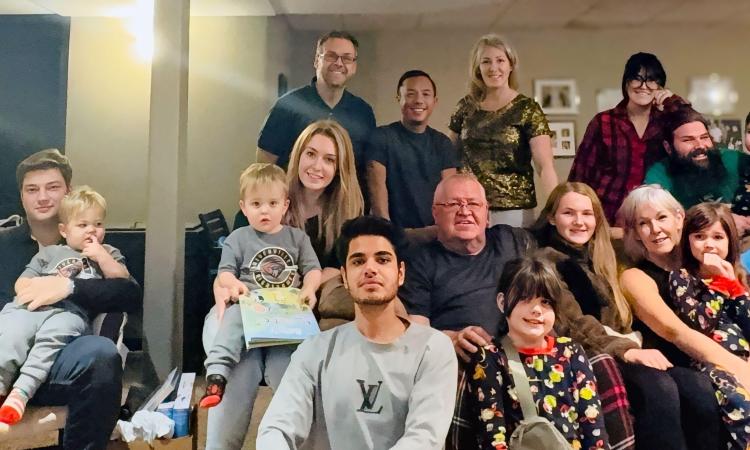 Anmol celebrates his first Christmas ever with the Braun family in Niverville.