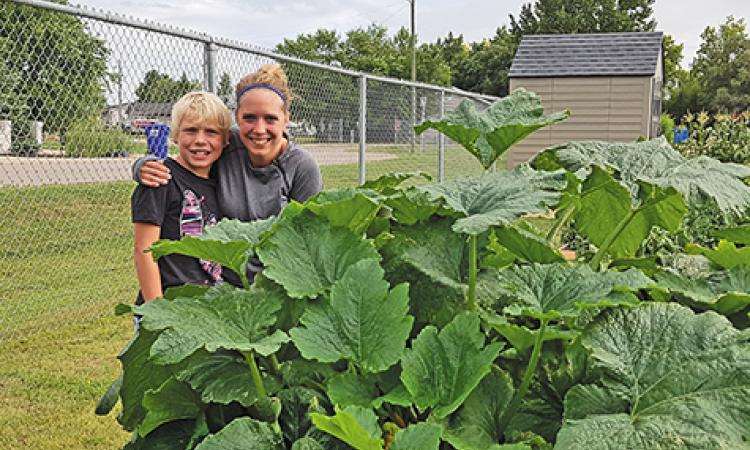 Milo and Desinee Ralph have spent the summer tending the Île-des-Chênes community gardens