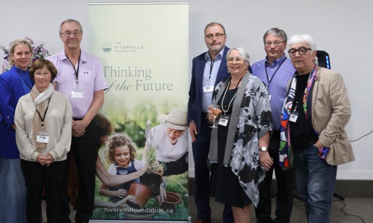 Incoming and outgoing directors: Keith Bueckert, Rachel Niessen, Libby Hanna, Paul Dufour, Ken Rempel, Annette Fast, Andrew Neufeld, and Ludolf Grollé.