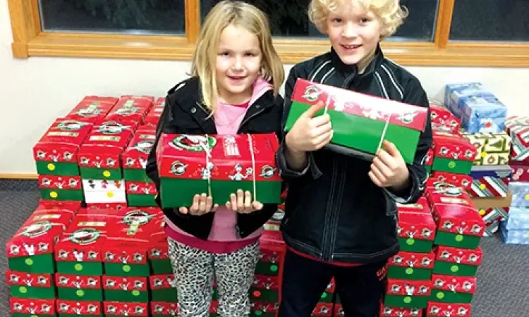 Willa and Max Dowse with their shoebox donations