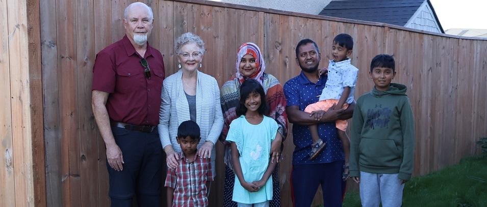 Brent and Ellen Byggdin with Abdul Paten, Sumaia Parvin, and their four children, including five-year-old Jibran.