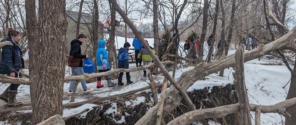 On March 1, a group of Grade Ten students from Niverville High School met up with a group of Niverville Middle School Grade Six students at St. Adolphe’s Friendship Trail to help teach them about natural resources and ecosystems.