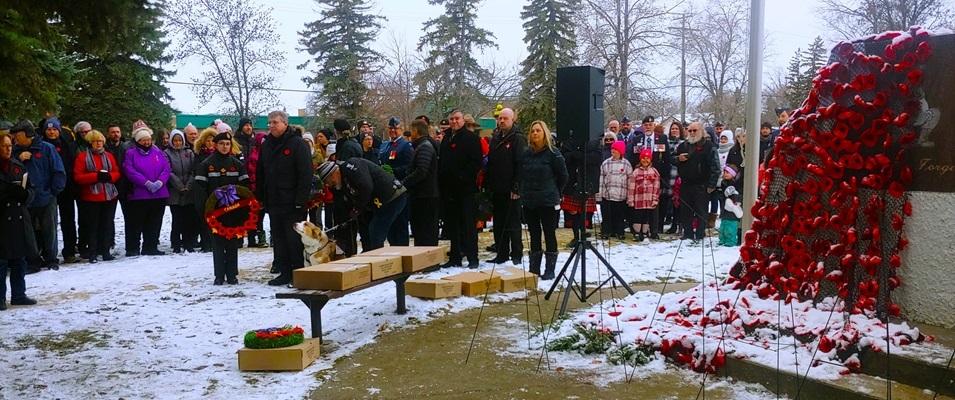 The community gathers at the cenotaph in Niverville.