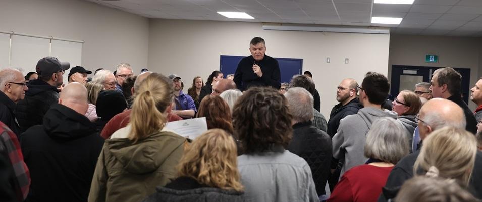 Mayor Myron Dyck addresses the crowd at an open house at the CRRC in Niverville.