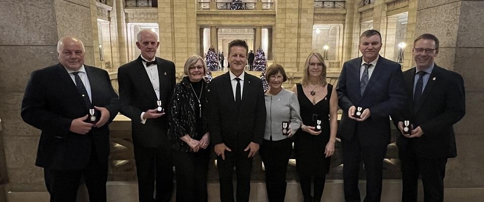 Gerald Palidwor, Shaun Crew, Bev Zarazan, Ron Schuler, Libby Hanna, Janine Boulanger, Myron Dyck, and Gord Daman.