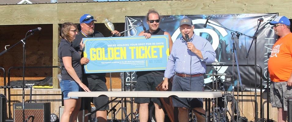Stephen McCabe and Kurt Carter of Lorette accept the grand prize at the first annual Niverville Smokemaster BBQ Competition.
