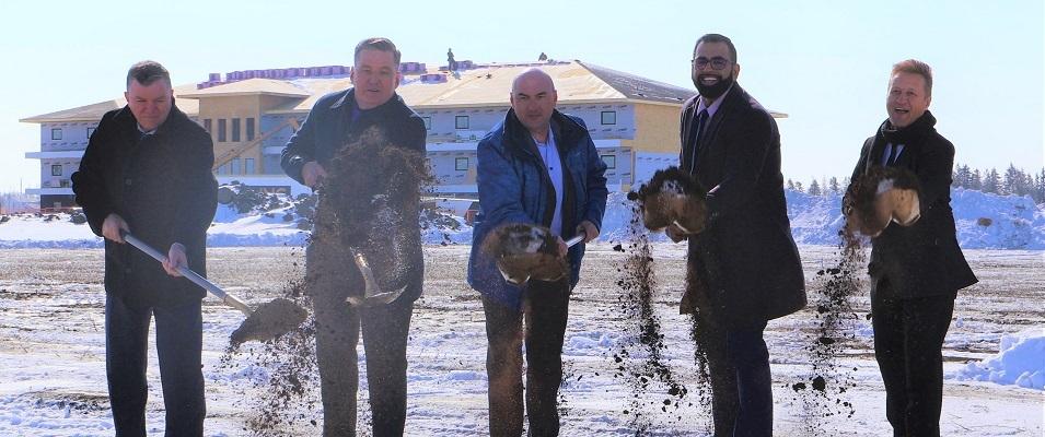 Myron Dyck (Mayor of Niverville), Doyle Piwniuk (Minister of Transportation and Infrastructure), Trevor Rempel (Steel Creek Developers), Obby Khan (Minister of Sport, Culture, and Heritage), and Ron Schuler (MLA for Springfield-Ritchot).