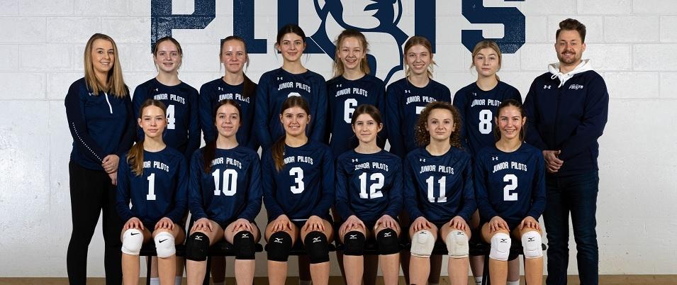 The Junior Pilots 15U Navy girls volleyball team.