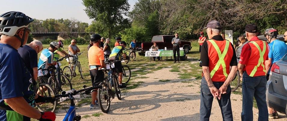 Historian Ernie Braun reads blessing at Peace Trek kickoff.