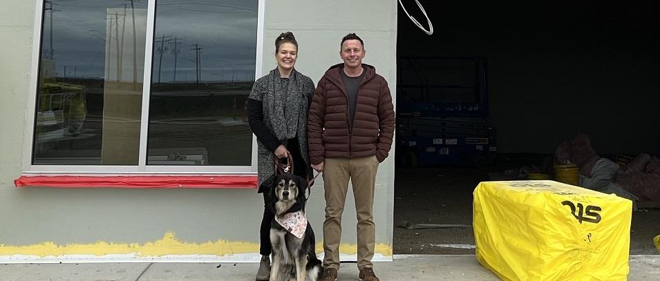 Nikki and Nick Hagidiakow standing in front of the future location of Pita Pit in Niverville.