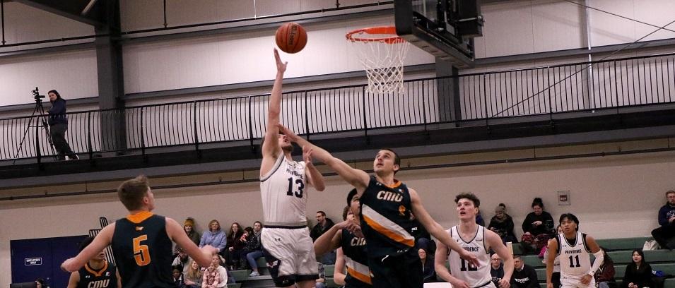 The men's basketball team on home court at the CRRC.