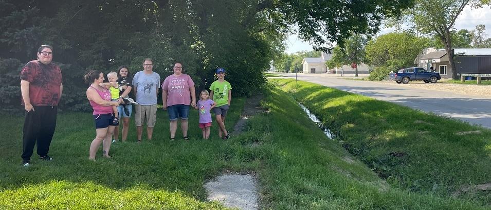 Families who live along First Street South are concerned about their street's impassable sidewalk.