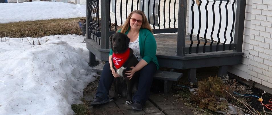 Carey Hawkins with her dog, Tundra.
