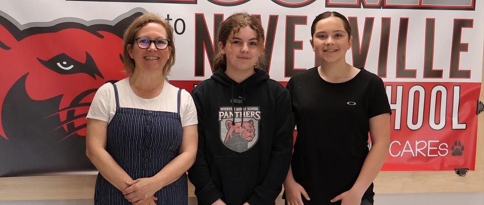 Ms. Van den Brul with students Kyra Bird and Ana Dean.