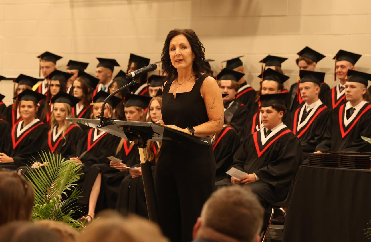 NHS Principal Kimberley Funk addresses this year's graduates.