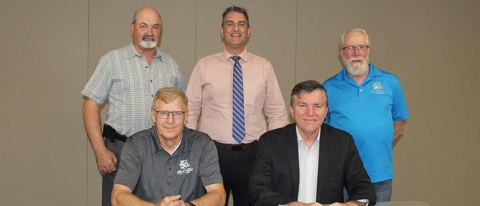 Back row: Councillors Kevin Stott, Nathan Dueck, and Chris Wiebe. Front row: Deputy Mayor John Funk and Mayor Myron Dyck.