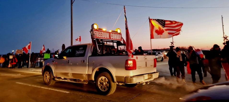 On Tuesday, January 25, crowds gathered at the Centre of Canada Park in the RM of Tache to show their support for a convoy of semi trucks and other vehicles making its way across the country in protest of a federal vaccination mandate for cross-border truckers.