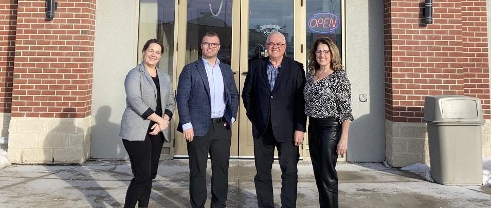 The Smitty’s management team of Kaely Dyck, Chris Dyck, Brian Funk, and Valerie Funk. Missing: Robert Dyck.