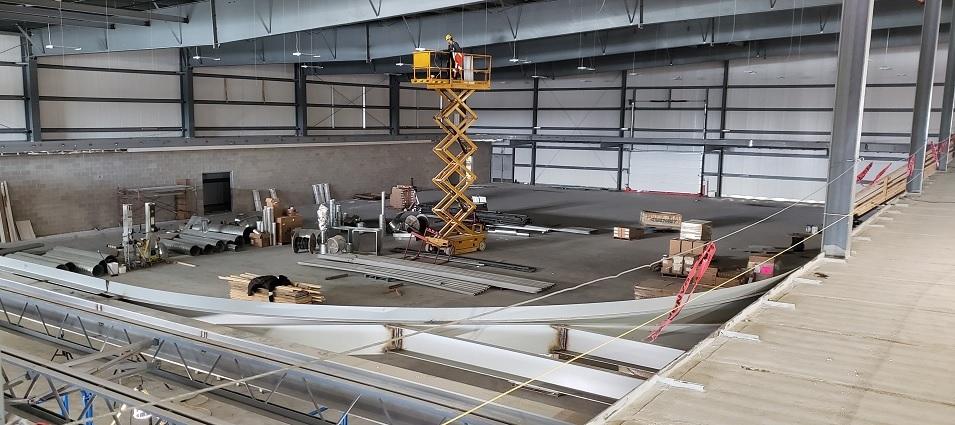 Photo 4: Construction continues in the fieldhouse side of the building, with space for a running track on the second level