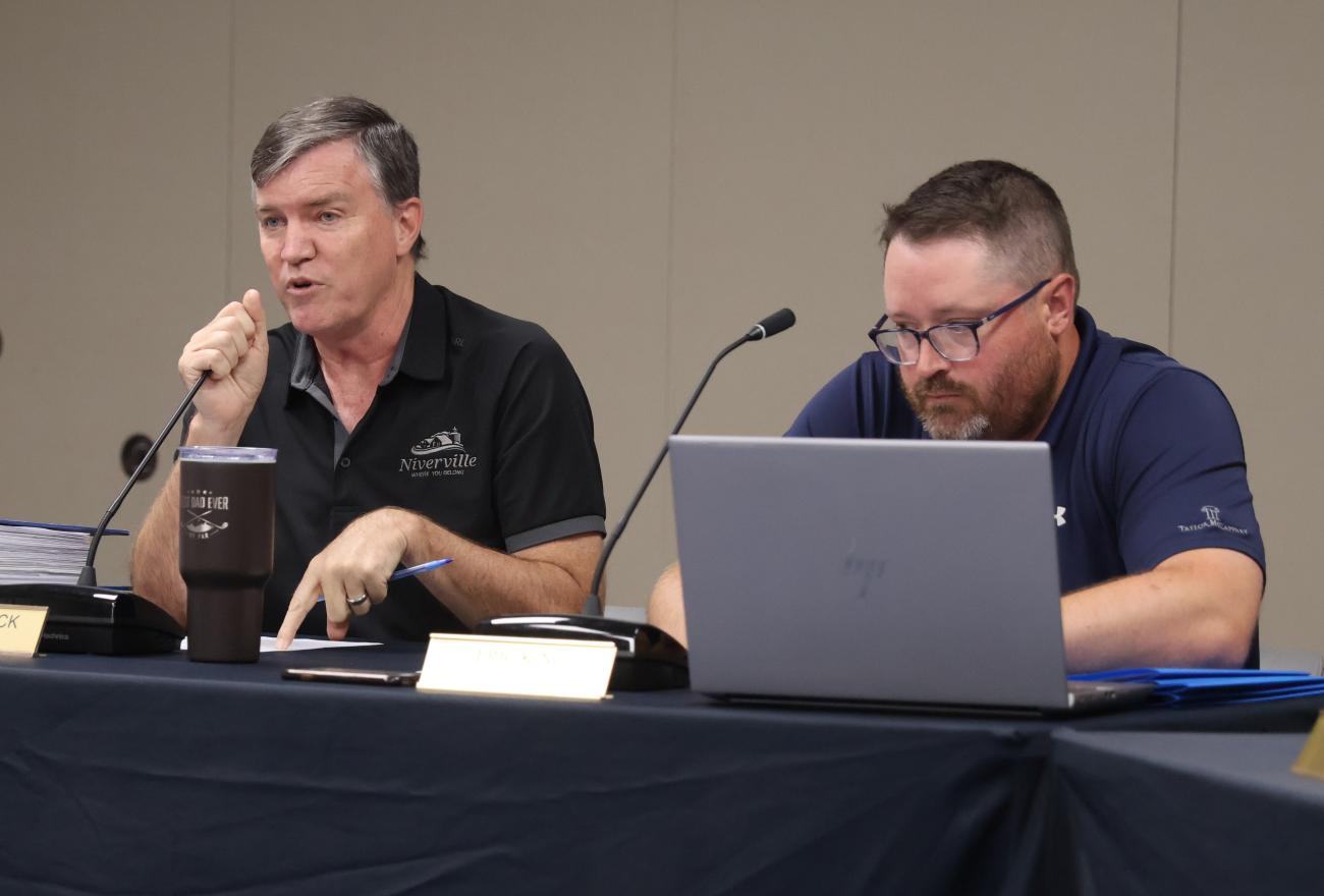 Niverville mayor Myron Dyck and CAO Eric King at a council meeting on August 8.
