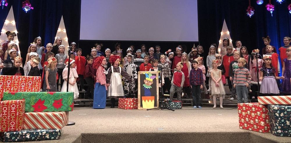 Grades One and Two students perform the Elementary School holiday show.