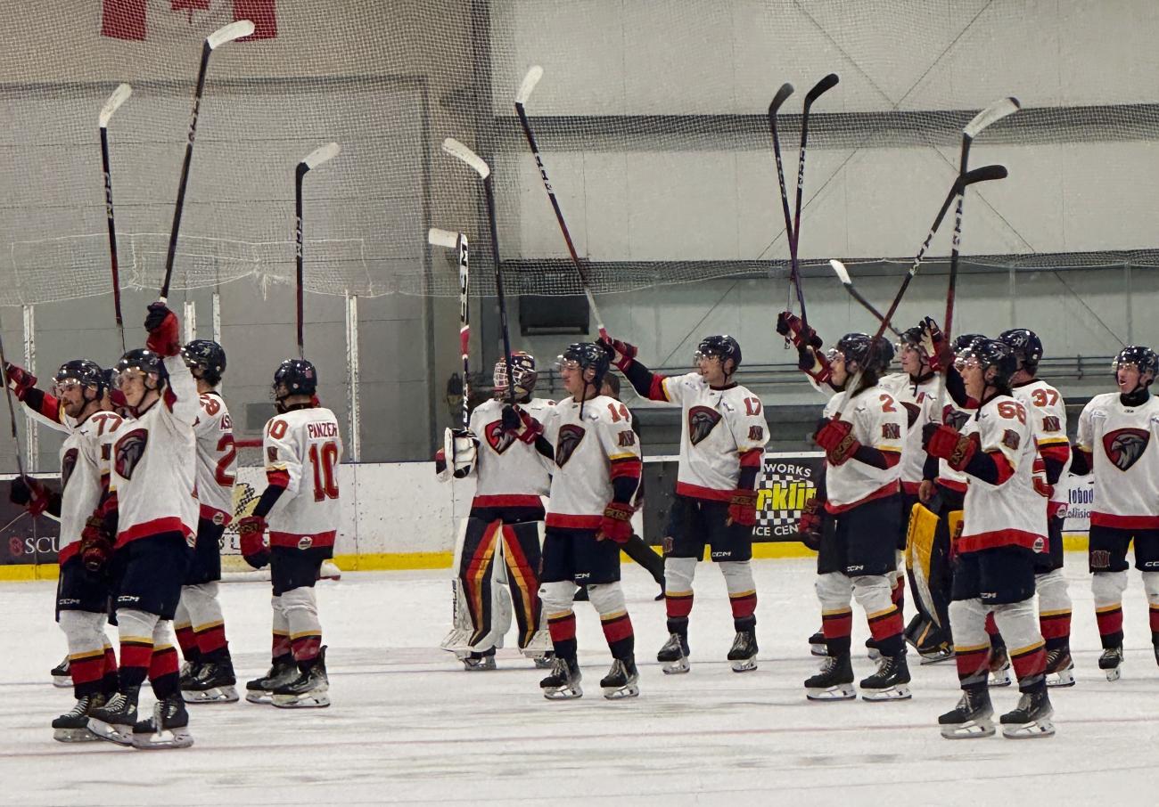The Nighthawks celebrate victory.
