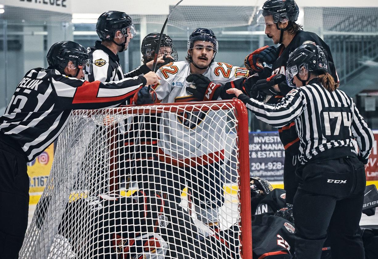The Nighthawks scramble around the net.