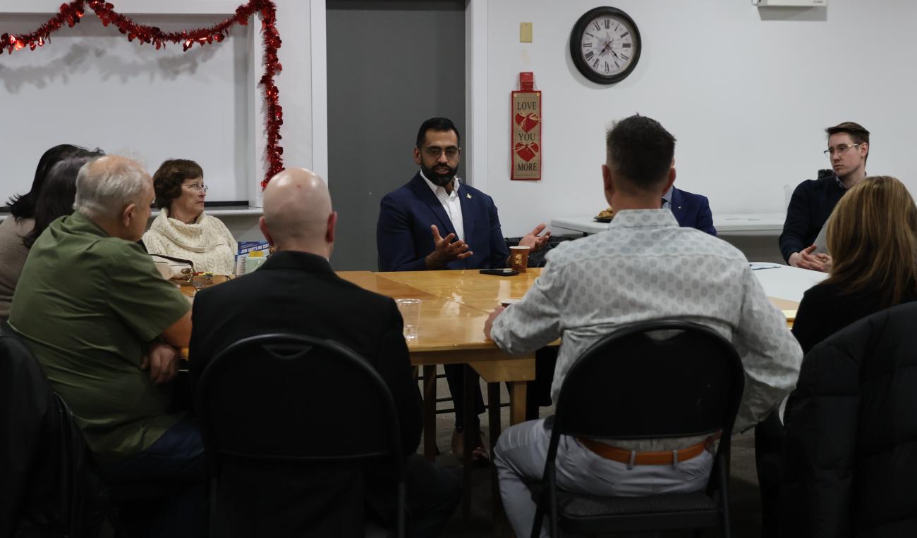 Obby Khan meets with supporters in Niverville.